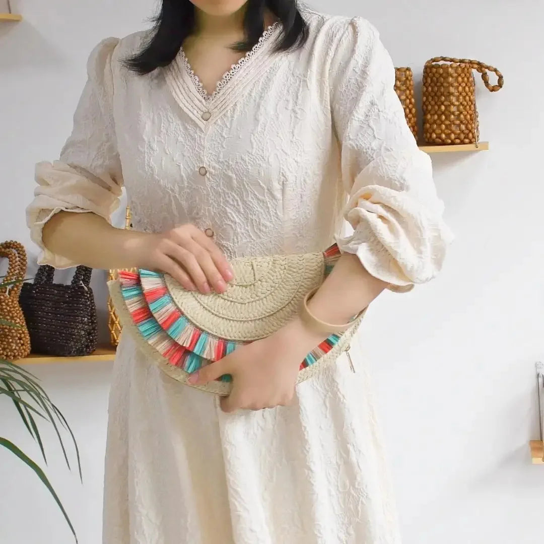 European And American Retro Woven Tassel Handbag Women's Summer Beach Vacation Niche Design Commuter Straw Dumpling Bag