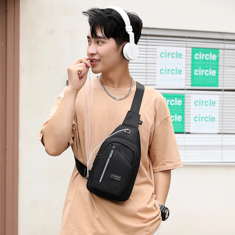 Fengdong male small chest bag mini crossbody bags for men travel bagpack one shoulder sport bag with earphone jack boy phone bag