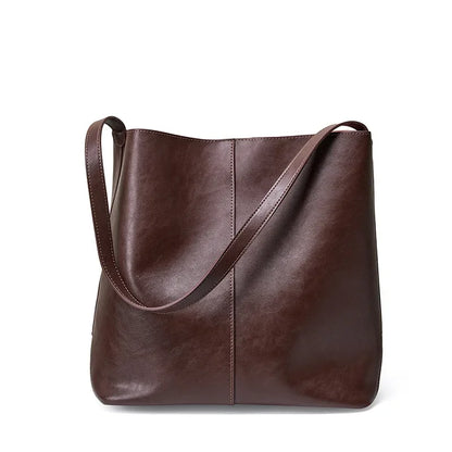 Genuine leather bucket bag, high-end niche tote bag, large capacity single shoulder crossbody bag, new for commuting in 2024