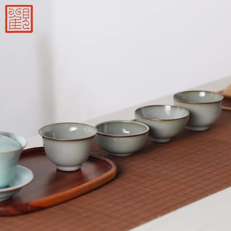 Guanfu Museum Longquan Official Glaze Tea Master Cup Purple Mouth Iron Foot Enameled Cast Iron Thick Pu'er Ice Crack Tea Bowl Gr