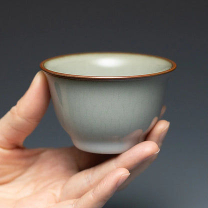 Guanfu Museum Longquan Official Glaze Tea Master Cup Purple Mouth Iron Foot Enameled Cast Iron Thick Pu'er Ice Crack Tea Bowl Gr