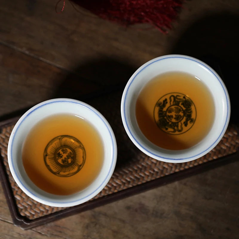 Hand painted blue and white Yongle pressed hand cup Jingdezhen tea cup ceramic tea cup Master Cup