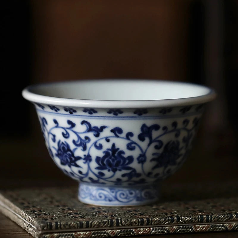 Hand painted blue and white Yongle pressed hand cup Jingdezhen tea cup ceramic tea cup Master Cup
