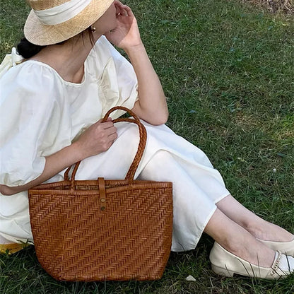 Hand-woven top layer cowhide women's French Braided cowhide hollowed-out vegetable  shopping basket bag