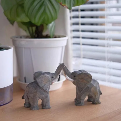 Handmade wooden carving objects,elephants,a pair of birthday and Christmas gifts,symbolizing a good artistic tabletop decoration