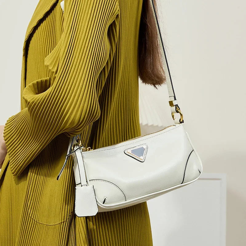 Head layer oil wax leather stick underarm bag for women's 2024 and niche design single shoulder crossbody bag