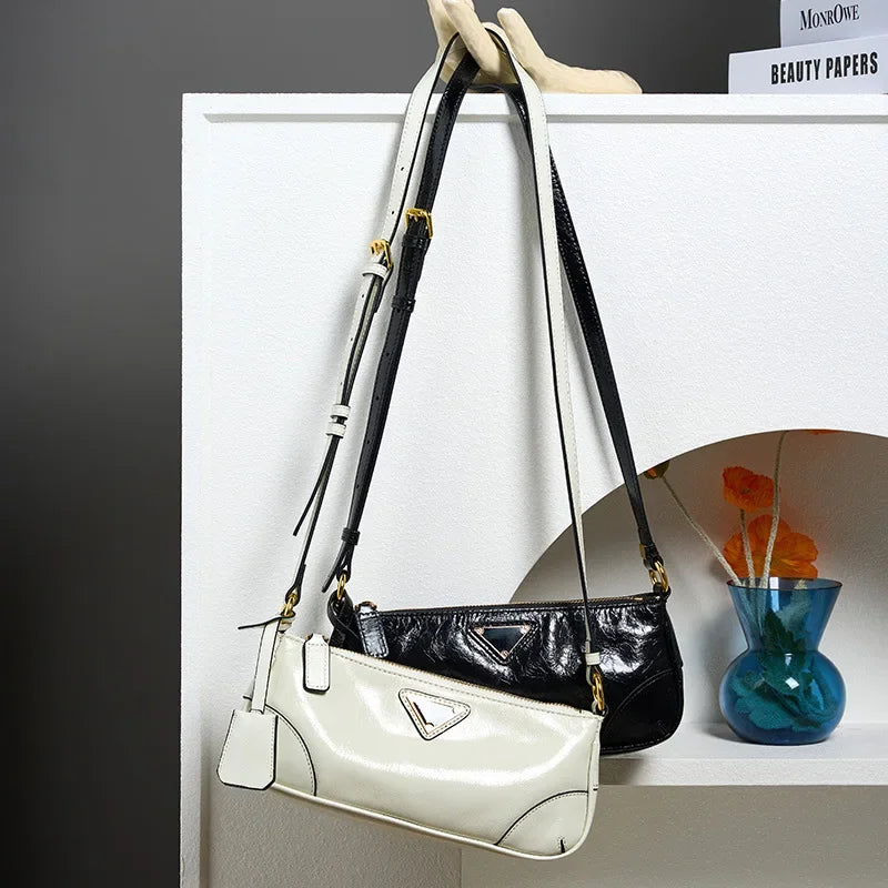 Head layer oil wax leather stick underarm bag for women's 2024 and niche design single shoulder crossbody bag