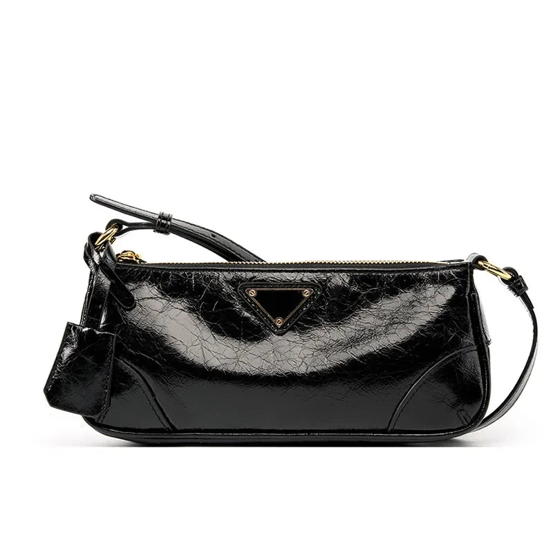 Head layer oil wax leather stick underarm bag for women's 2024 and niche design single shoulder crossbody bag