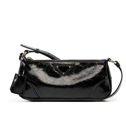 Head layer oil wax leather stick underarm bag for women's 2024 and niche design single shoulder crossbody bag