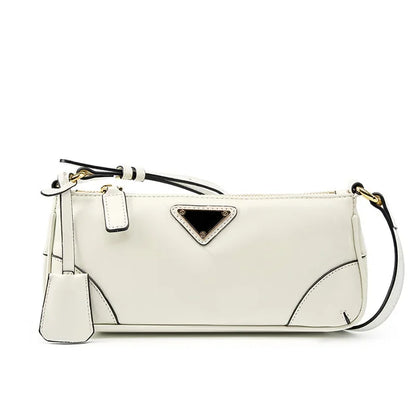 Head layer oil wax leather stick underarm bag for women's 2024 and niche design single shoulder crossbody bag