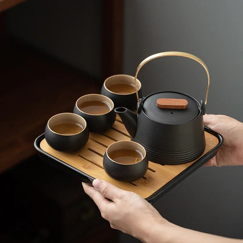 Japanese Style Black Pottery Handle Teapot Tea Set One Pot Four Cups With Bag Kungfu Home Tea Set Office Travel Teaware Gifts
