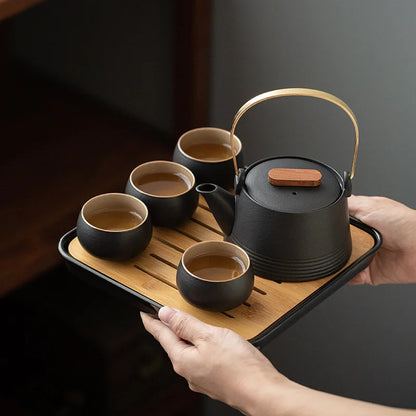 Japanese Style Black Pottery Handle Teapot Tea Set One Pot Four Cups With Bag Kungfu Home Tea Set Office Travel Teaware Gifts