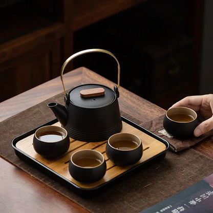 Japanese Style Black Pottery Handle Teapot Tea Set One Pot Four Cups With Bag Kungfu Home Tea Set Office Travel Teaware Gifts