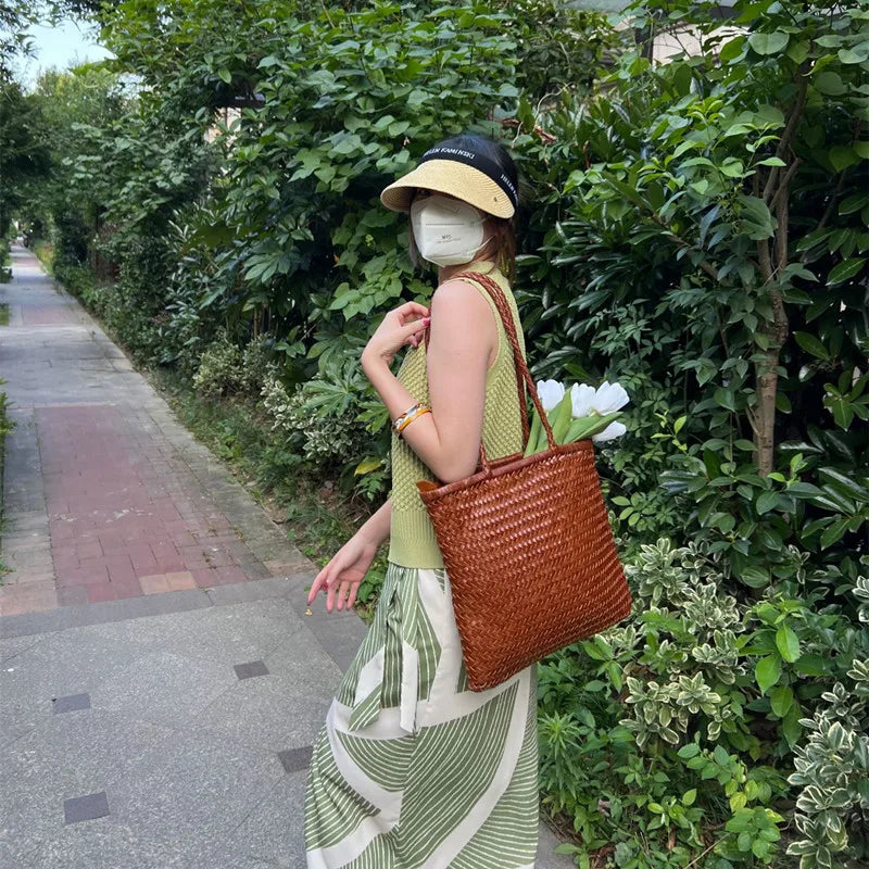 Japanese top layer cowhide hand woven shoulder bag  retro leather woven bucket bag Single shoulder vegetable basket bag female