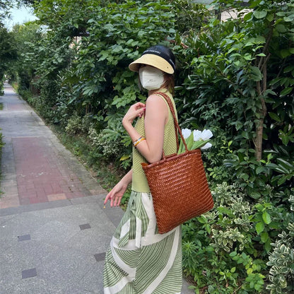 Japanese top layer cowhide hand woven shoulder bag  retro leather woven bucket bag Single shoulder vegetable basket bag female