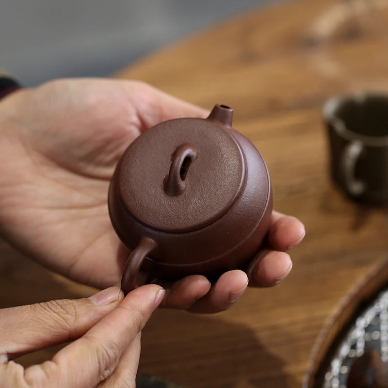 Monohydrate hall yixing recommended kung fu tea pot manual clear ship bottom tank bead pu 'er tea tea set 130 ml