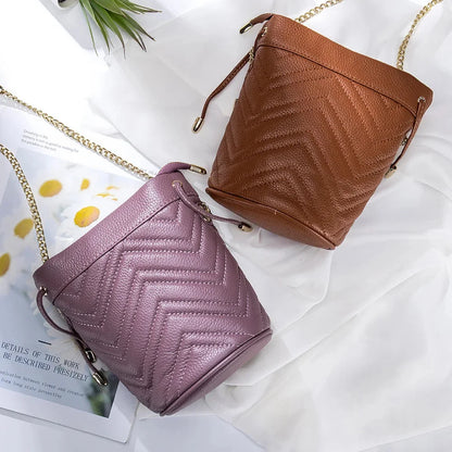 New Cowhide Fashion Chain Women's Striped Body Line One Shoulder Cross-body Soft Leather Bucket Bag Large Capacity