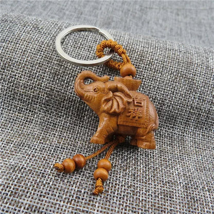 Peach wood carved elephant keychain pendant, hanging accessories, safe and auspicious feng shui small pendant,solid wood knot