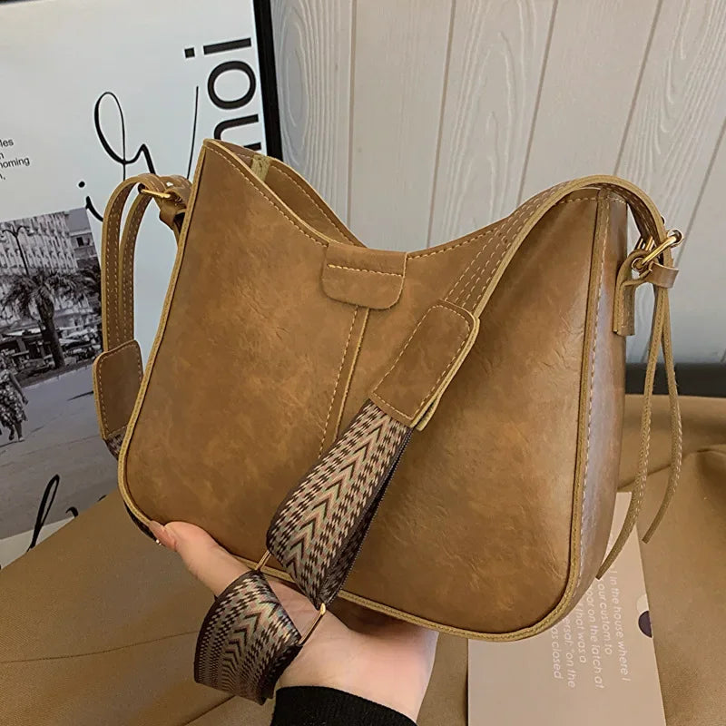 Retro Commuting Bags 2024 Women's Bag New Simple Bucket Bag Wide Shoulder Strap Crossbody Bag luxury bags designer