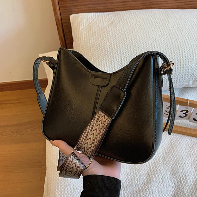 Retro Commuting Bags 2024 Women's Bag New Simple Bucket Bag Wide Shoulder Strap Crossbody Bag luxury bags designer