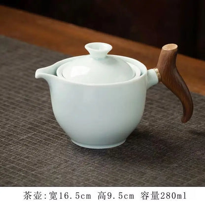 Side handle glass teapot, comfortable bubble rotating teapot, household portable travel tea set, internet red anti scald teapot