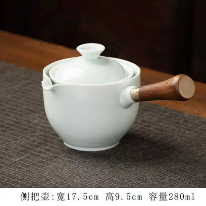 Side handle glass teapot, comfortable bubble rotating teapot, household portable travel tea set, internet red anti scald teapot