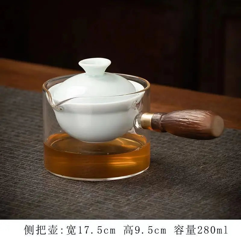 Side handle glass teapot, comfortable bubble rotating teapot, household portable travel tea set, internet red anti scald teapot