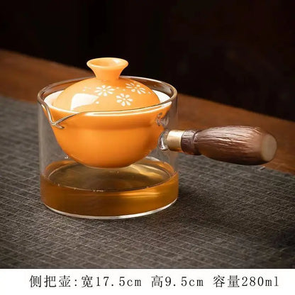 Side handle glass teapot, comfortable bubble rotating teapot, household portable travel tea set, internet red anti scald teapot