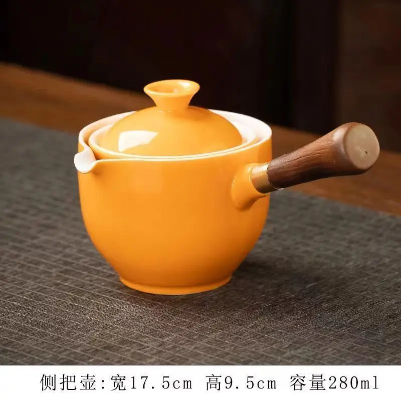 Side handle glass teapot, comfortable bubble rotating teapot, household portable travel tea set, internet red anti scald teapot