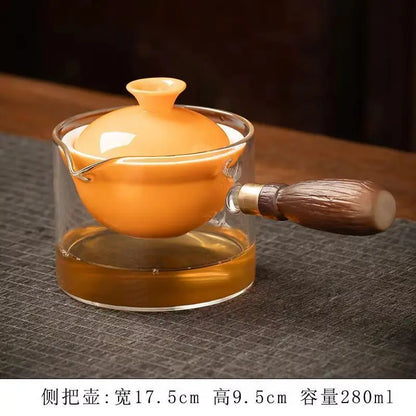 Side handle glass teapot, comfortable bubble rotating teapot, household portable travel tea set, internet red anti scald teapot