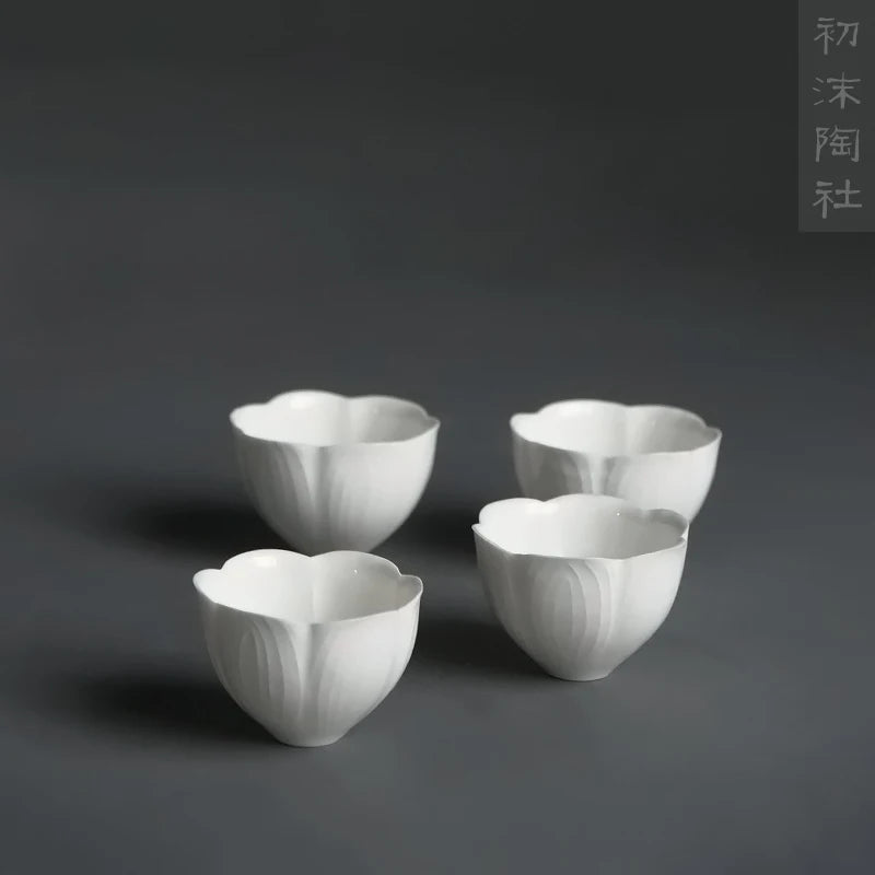 Spray at the beginning of the jingdezhen hand-carved cup sweet white glaze flower petals ling thin sample tea cup