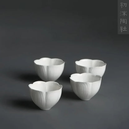 Spray at the beginning of the jingdezhen hand-carved cup sweet white glaze flower petals ling thin sample tea cup