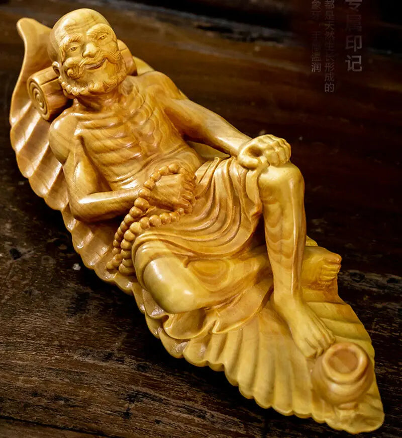 TL089 -- 17.5 x 6.5 x 5 CM Hand Carved Boxwood Figurine Carving : Damo Luo Han Monk on Leaf