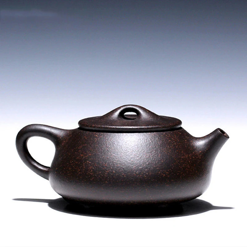 Tetera de arcilla púrpura Yixing de alta calidad, juego de té chino Zisha con filtro de piedra, hecho a mano