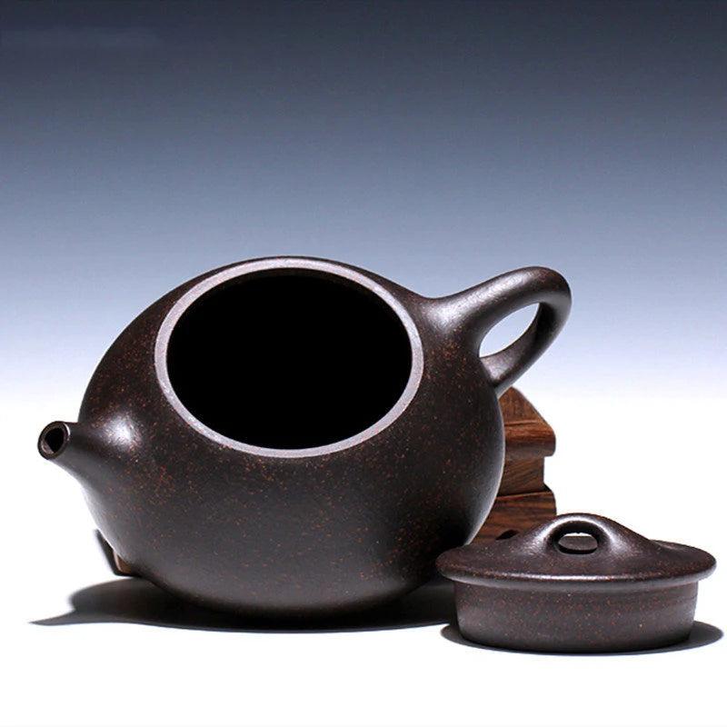 Tetera de arcilla púrpura Yixing de alta calidad, juego de té chino Zisha con filtro de piedra, hecho a mano