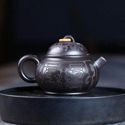 Tetera de barro negro tallada a mano, de arcilla Yixing auténtica, Teaware chino tradicional, juego de Zisha de belleza, 180ml