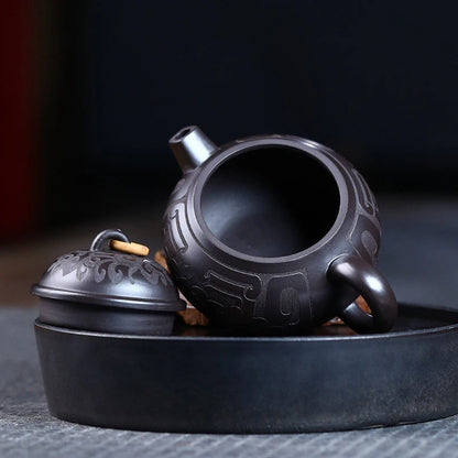 Tetera de barro negro tallada a mano, de arcilla Yixing auténtica, Teaware chino tradicional, juego de Zisha de belleza, 180ml