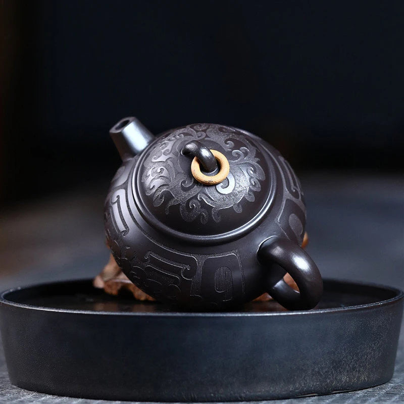 Tetera de barro negro tallada a mano, de arcilla Yixing auténtica, Teaware chino tradicional, juego de Zisha de belleza, 180ml