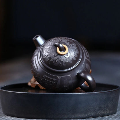 Tetera de barro negro tallada a mano, de arcilla Yixing auténtica, Teaware chino tradicional, juego de Zisha de belleza, 180ml