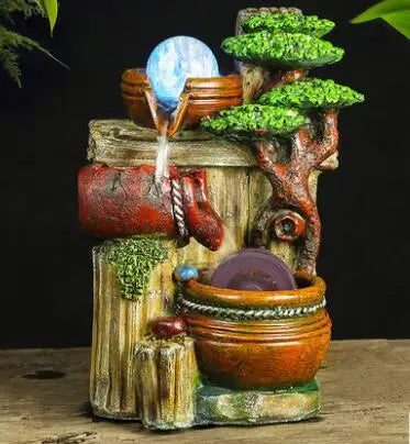 The artificial mountain water fountain is the living room TV cabinet office desktop decoration small statue