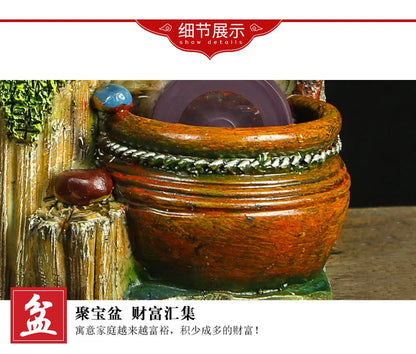 The artificial mountain water fountain is the living room TV cabinet office desktop decoration small statue