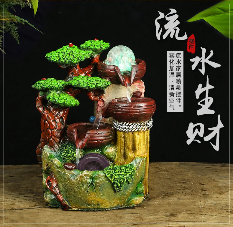 The artificial mountain water fountain is the living room TV cabinet office desktop decoration small statue