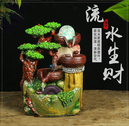 The artificial mountain water fountain is the living room TV cabinet office desktop decoration small statue
