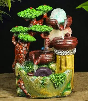 The artificial mountain water fountain is the living room TV cabinet office desktop decoration small statue