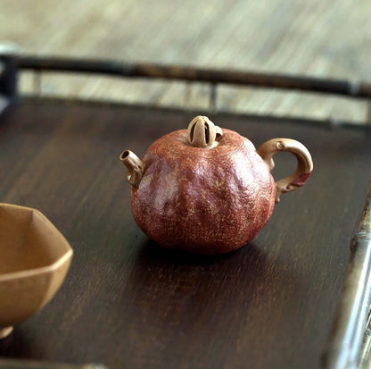 Yishuitang Yixing raw ore pure handmade Xiangqi duanni pink mud pomegranate pot 120ml Kungfu sketch pot