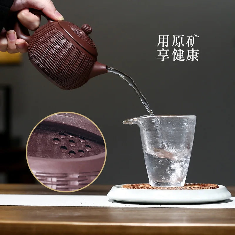 Yixing purple clay teapot is a pure handmade teapot with inner wall decorated with Kung Fu Tea
