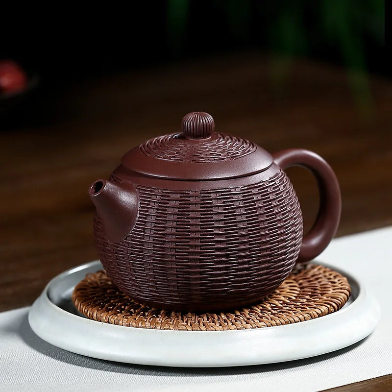 Yixing purple clay teapot is a pure handmade teapot with inner wall decorated with Kung Fu Tea