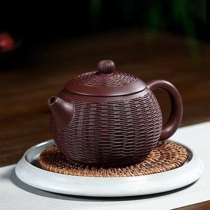 Yixing purple clay teapot is a pure handmade teapot with inner wall decorated with Kung Fu Tea