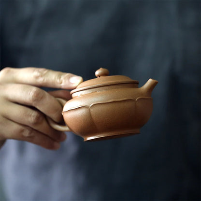 Yixing raw ore pure handmade purple clay pot old purple clay caltrop pot 210cc lotus petals elegant and ancient