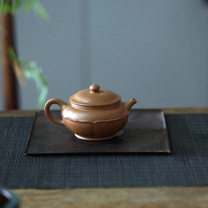 Yixing raw ore pure handmade purple clay pot old purple clay caltrop pot 210cc lotus petals elegant and ancient